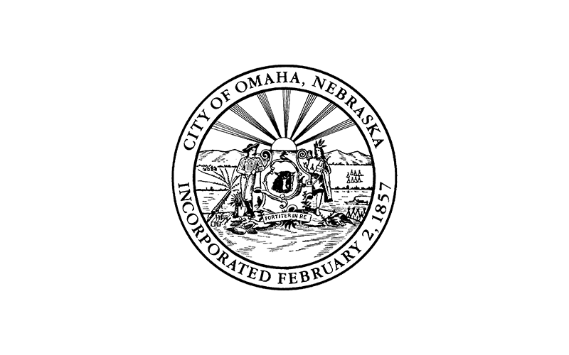 The seal of Omaha, Nebraska, depicting a pioneer scene with a steamboat, shield, and railroad, with text "City of Omaha, Nebraska Incorporated February 2, 1857.