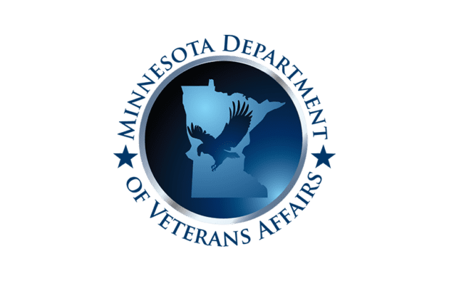 A circular logo with a silhouette of Minnesota and an eagle in flight in the center.