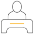 Icon of a person sitting at a desk, depicted in a minimalist style with a thin horizontal line on the desk.