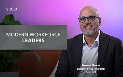 A person in a suit smiles in front of a purple background. Text reads "Modern Workforce Leaders.