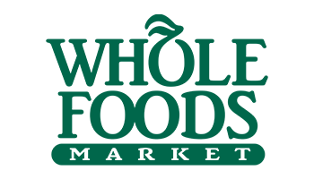 Whole Foods Market logo in green with a stylized leaf above the letter 'O' in "Whole.