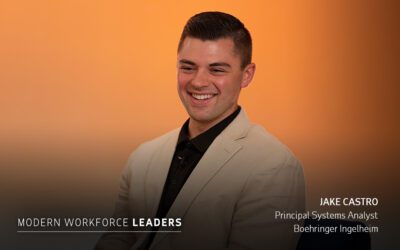 A man in a beige blazer and black shirt is smiling in front of an orange background. Text reads "Jake Castro, Principal Systems Analyst, Boehringer Ingelheim.